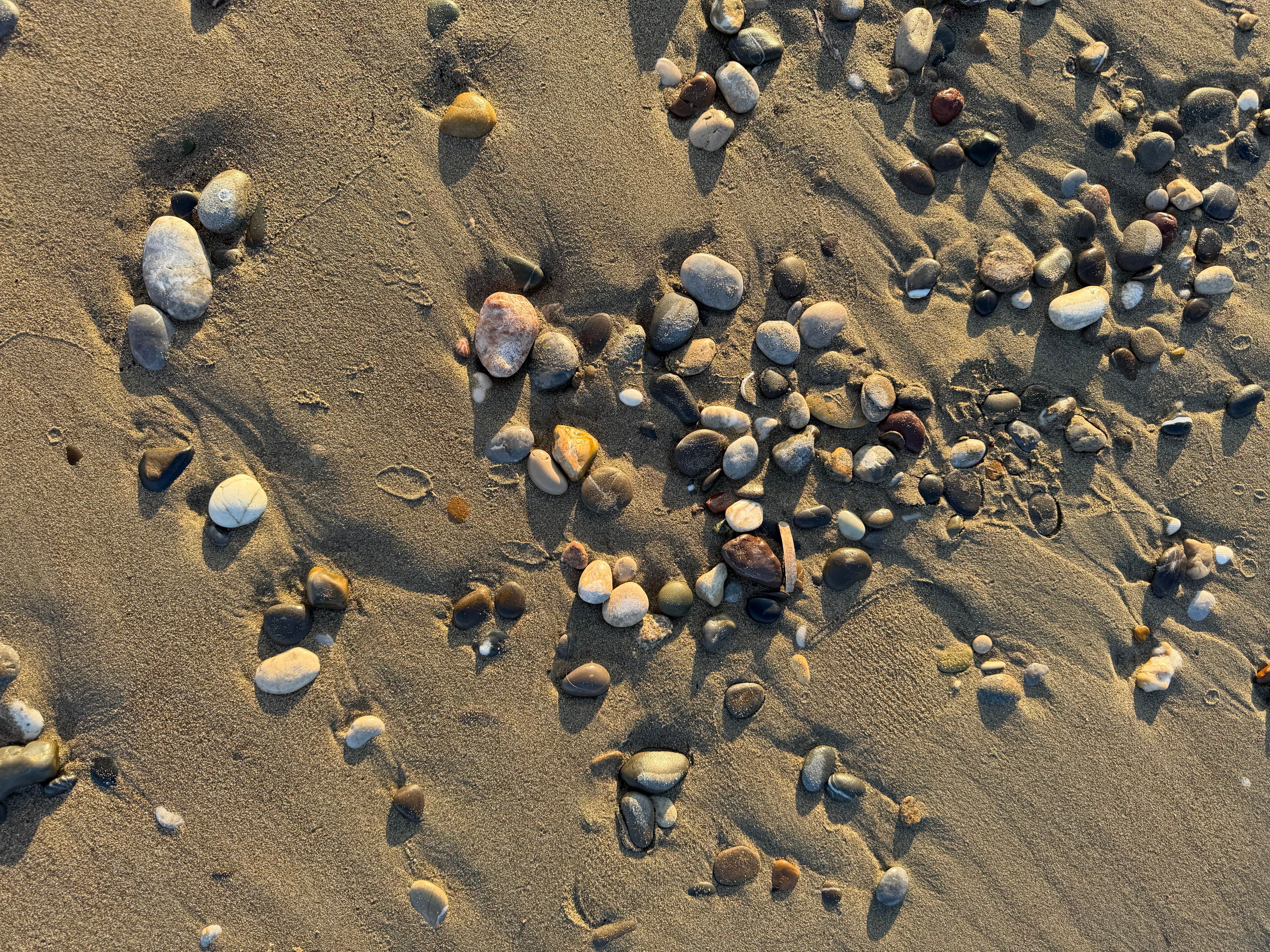 Pebbles on Sandy Beach at Antalya Shore · Free Stock Photo