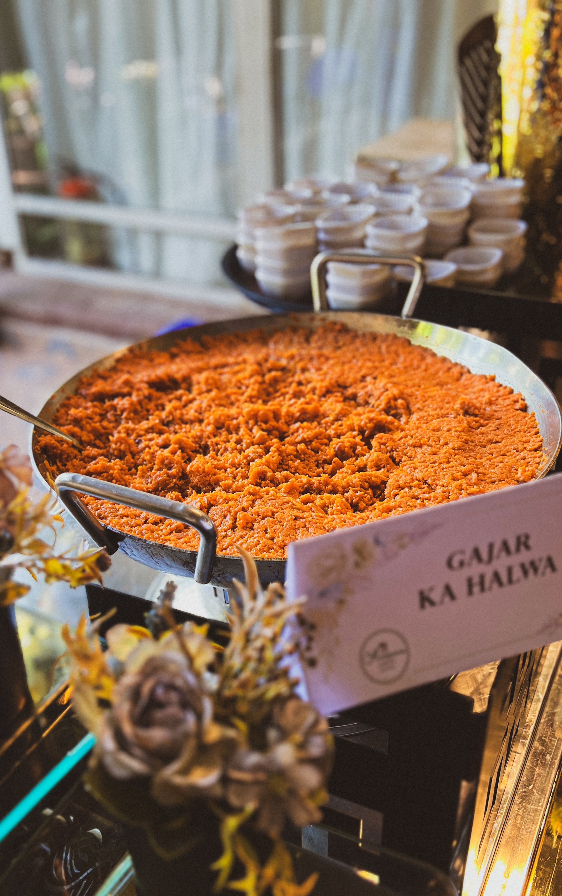 Gajar halwa served at a buffet table