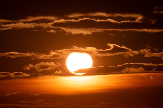 Capture of a vibrant sunrise with dramatic clouds in Stamford, Connecticut.