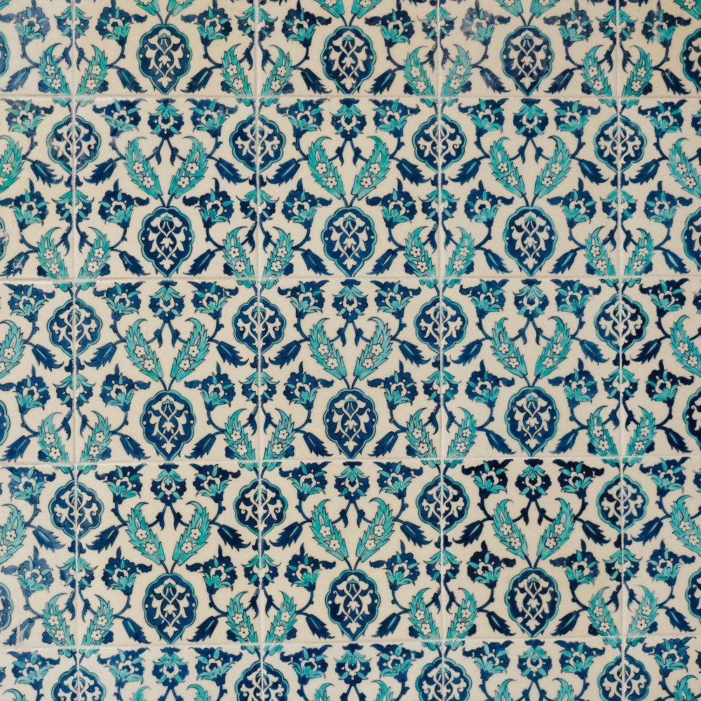 Wallpapering in Yiewsley — a decorator at work mid-project