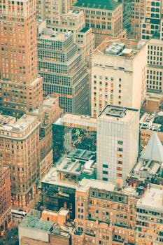 Aerial image of New York City's iconic skyscrapers, showcasing urban architecture.