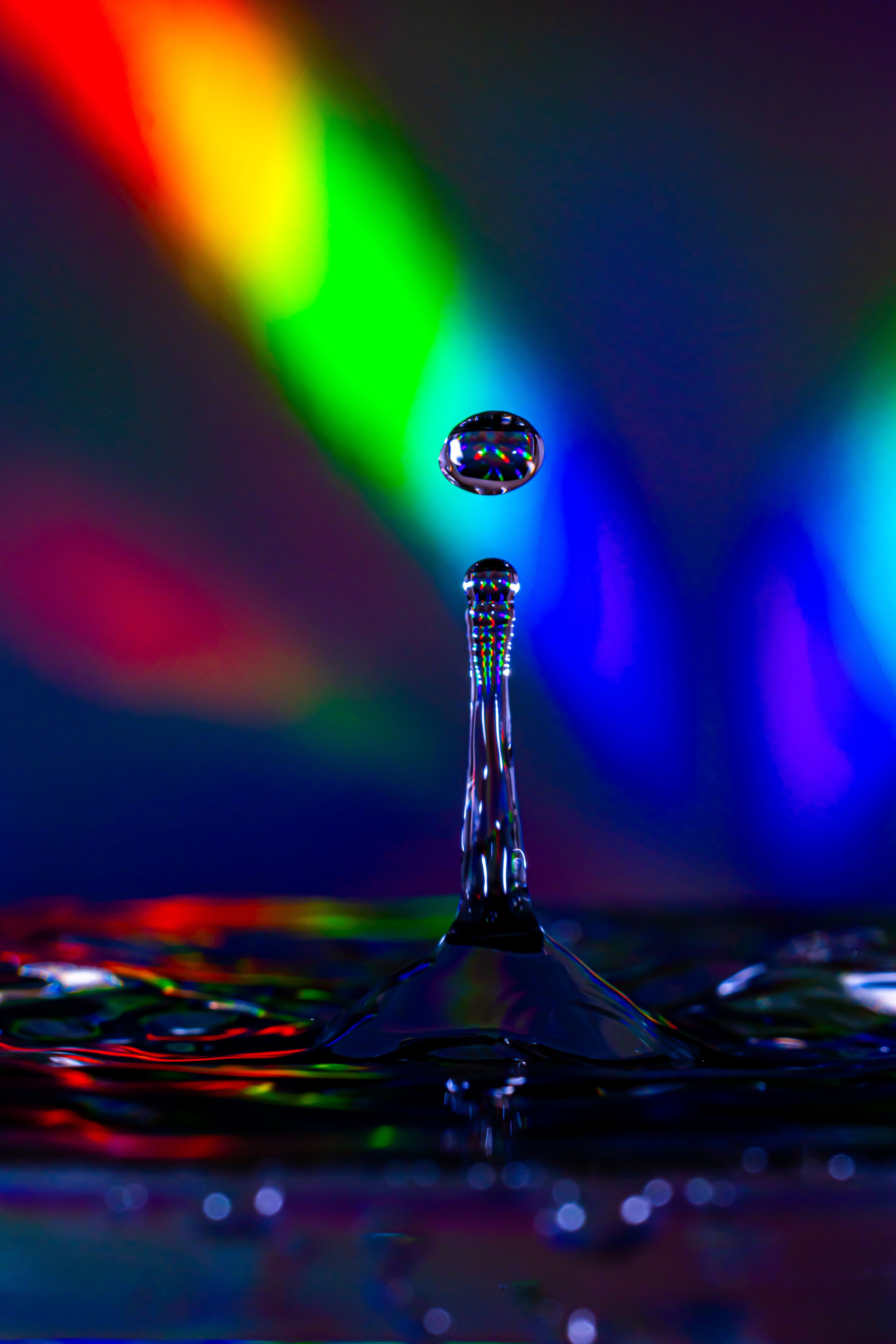 Vibrant Rainbow Water Droplet Reflection · Free Stock Photo