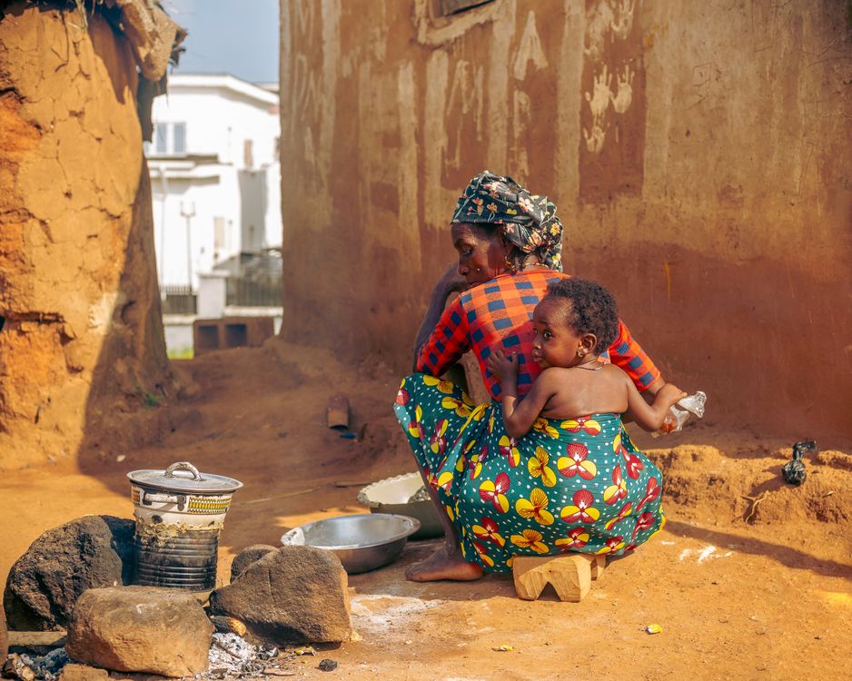 Cooking Rural Mother Mother and Child Cooking in an African Village · Free Stock Photo