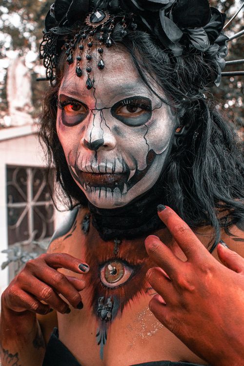 Free Artistic portrait showcasing vibrant Day of the Dead makeup in Mexico City. Stock Photo