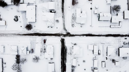 Aerial Photo of Houses Covered with Snow