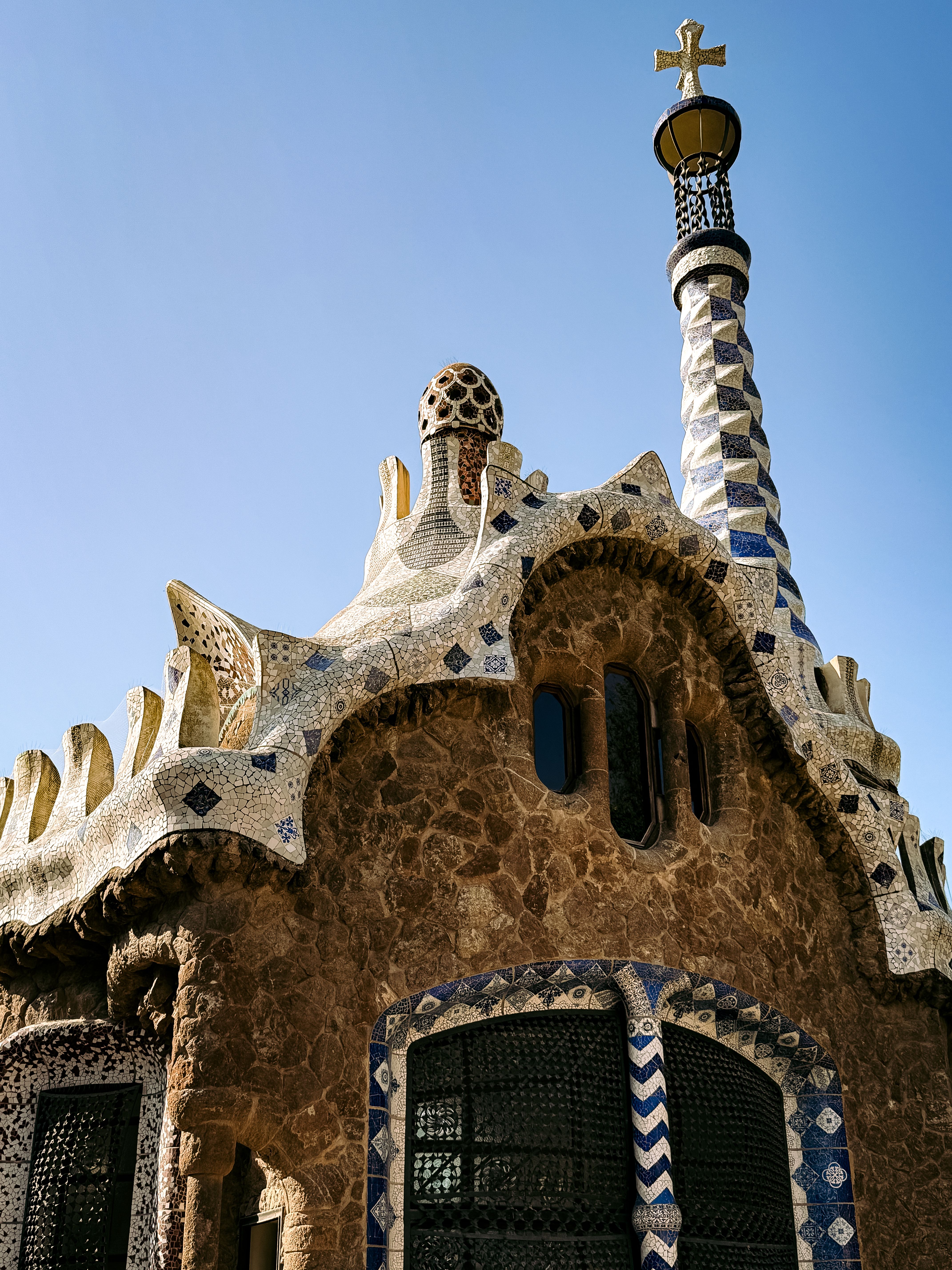 Capture of unique Gaudí-designed architecture in Park Güell, showcasing distinct Catalonian style.