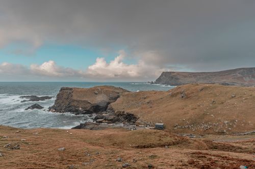 Free Experience the dramatic coastal cliffs and rugged beauty of Ireland's Wild Atlantic Way with this captivating landscape photo. Stock Photo