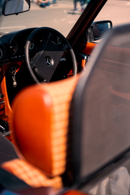 Elegant Classic Car Interior in Sunlight · Free Stock Photo
