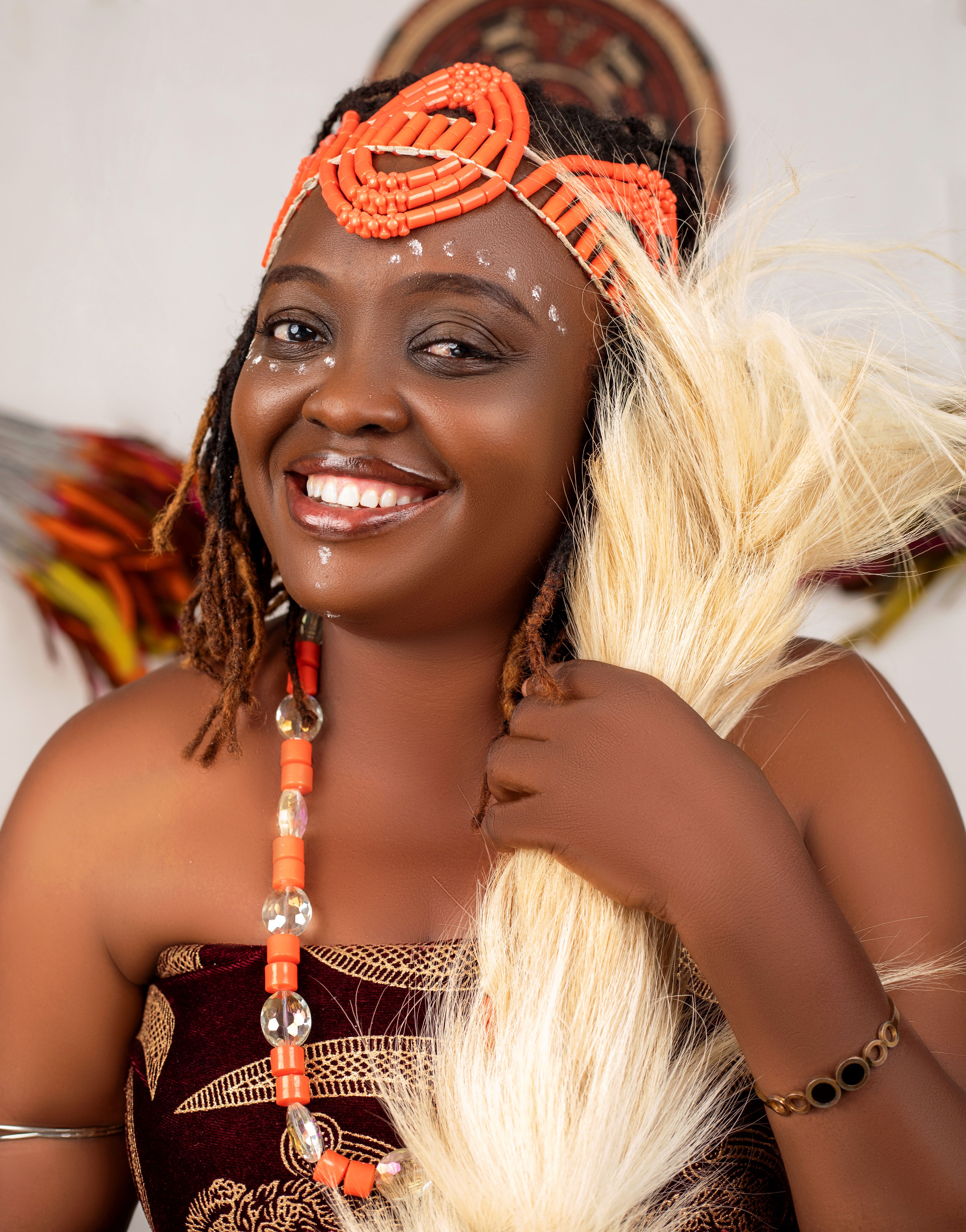 Smiling Woman in Traditional African Attire