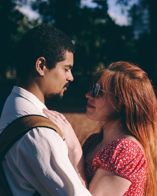Free A couple lovingly embracing outdoors in Buenos Aires, capturing an intimate moment. Stock Photo