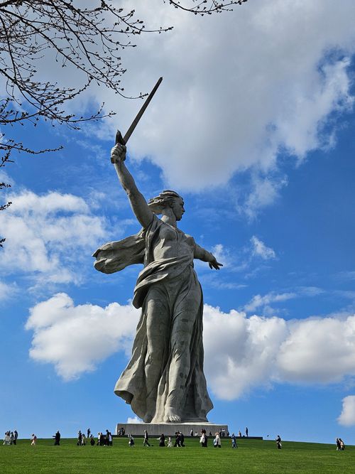 Free A stunning view of the Motherland Calls statue under a blue sky in Volgograd, Russia. Stock Photo
