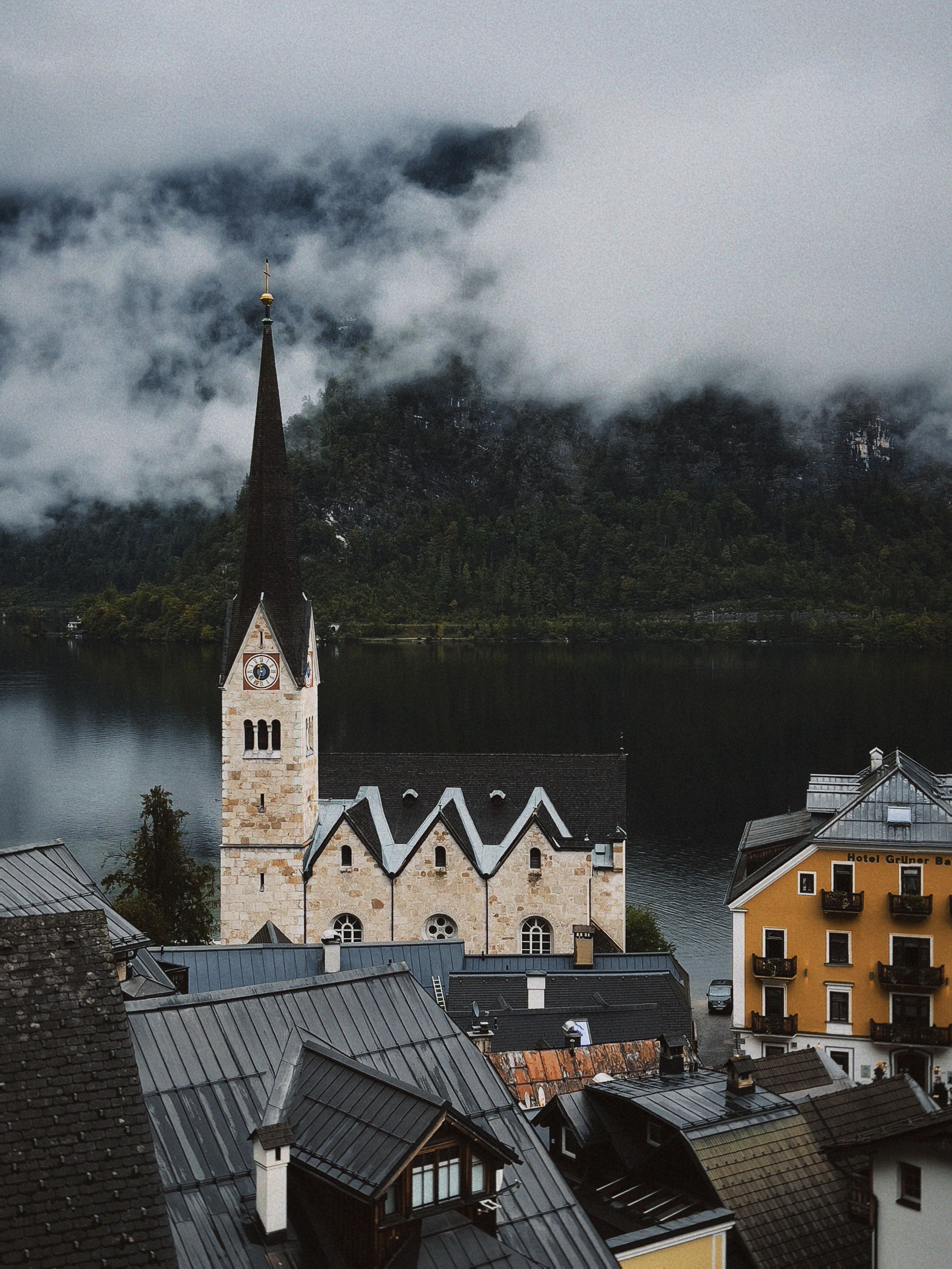 Scenic View of Hallstatt Church by the Lake · Free Stock Photo