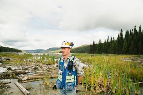 Shallow Focus Photo of Man in White Safety Hat