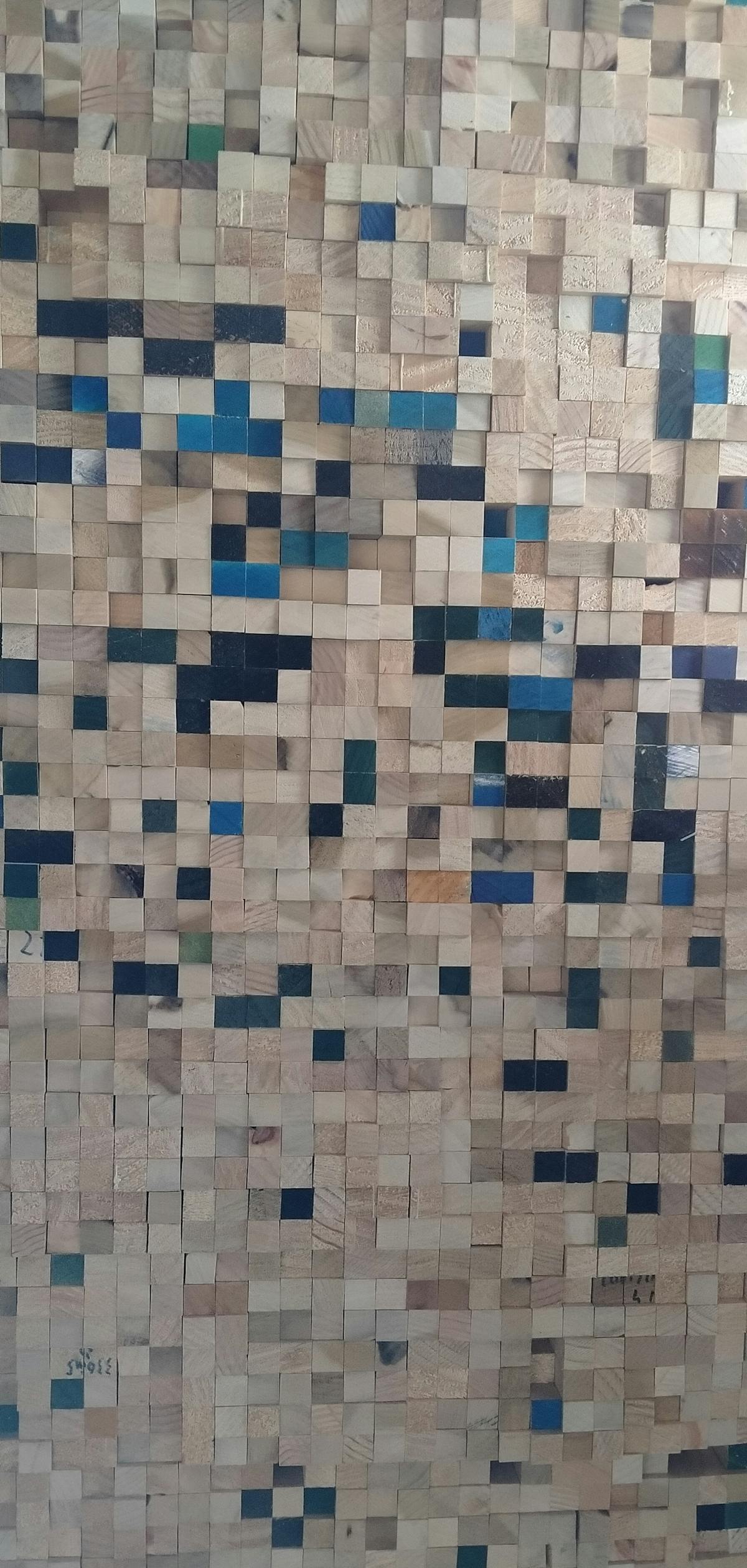 Professional basketball players battling for a rebound in an arena