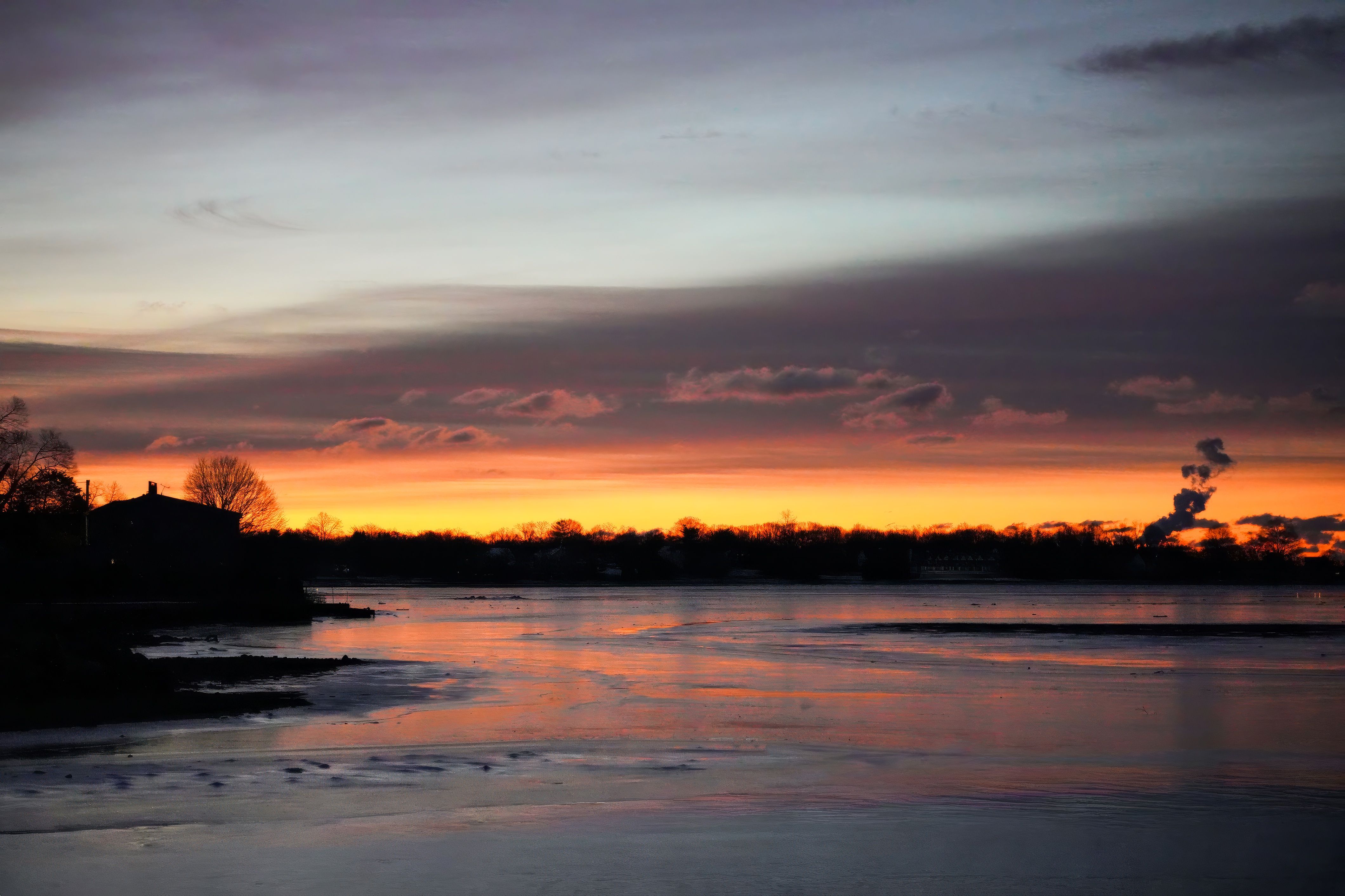 Serene Sunset Over Tranquil Water Body · Free Stock Photo