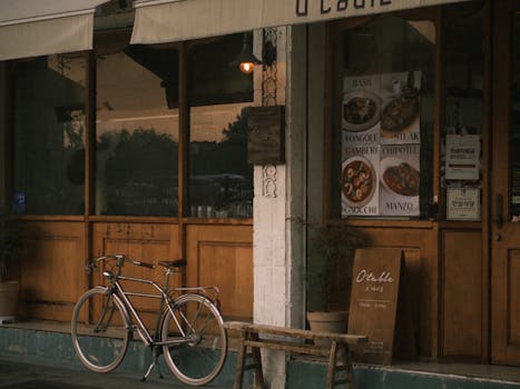 Vintage-style Korean cafe in Seoul with a bicycle parked outside.