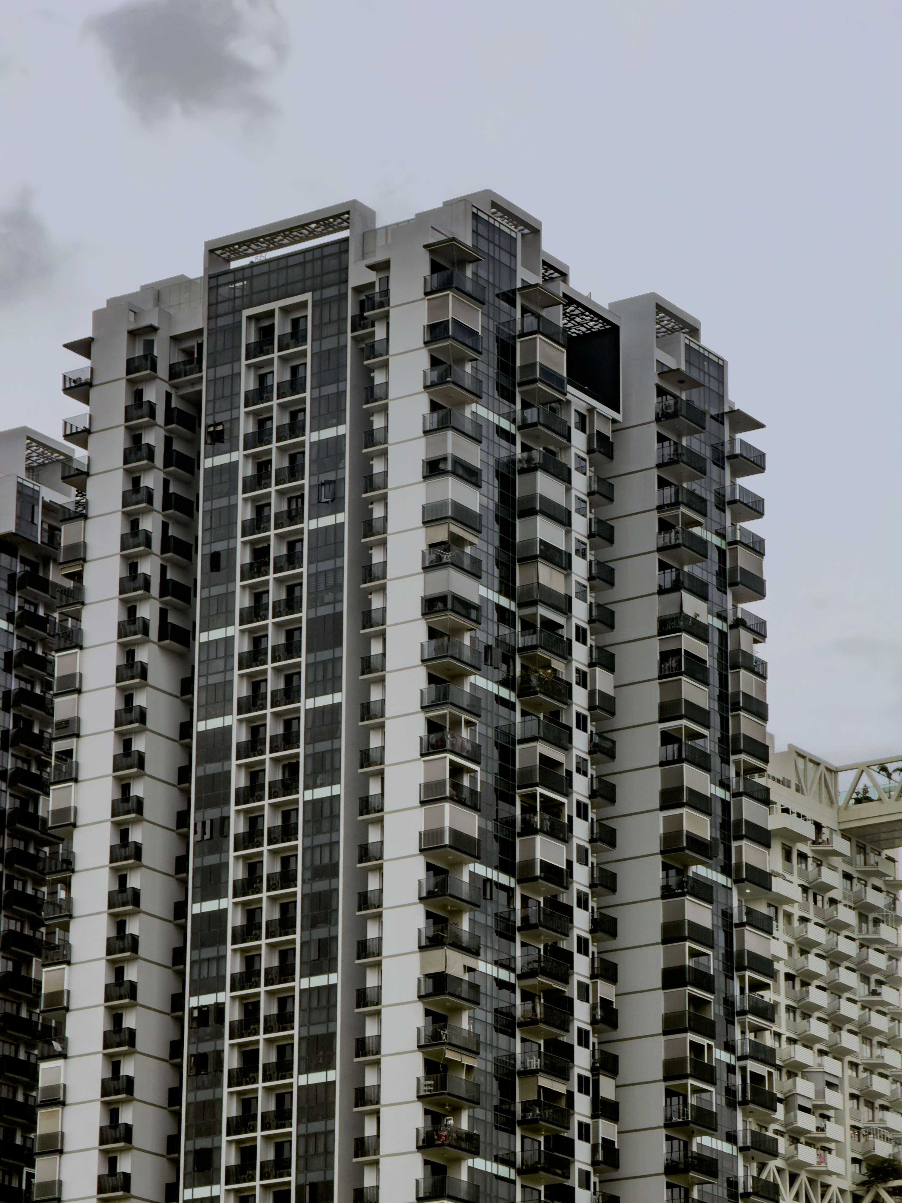 Modern High-rise Apartment Building in Urban Setting · Free Stock Photo