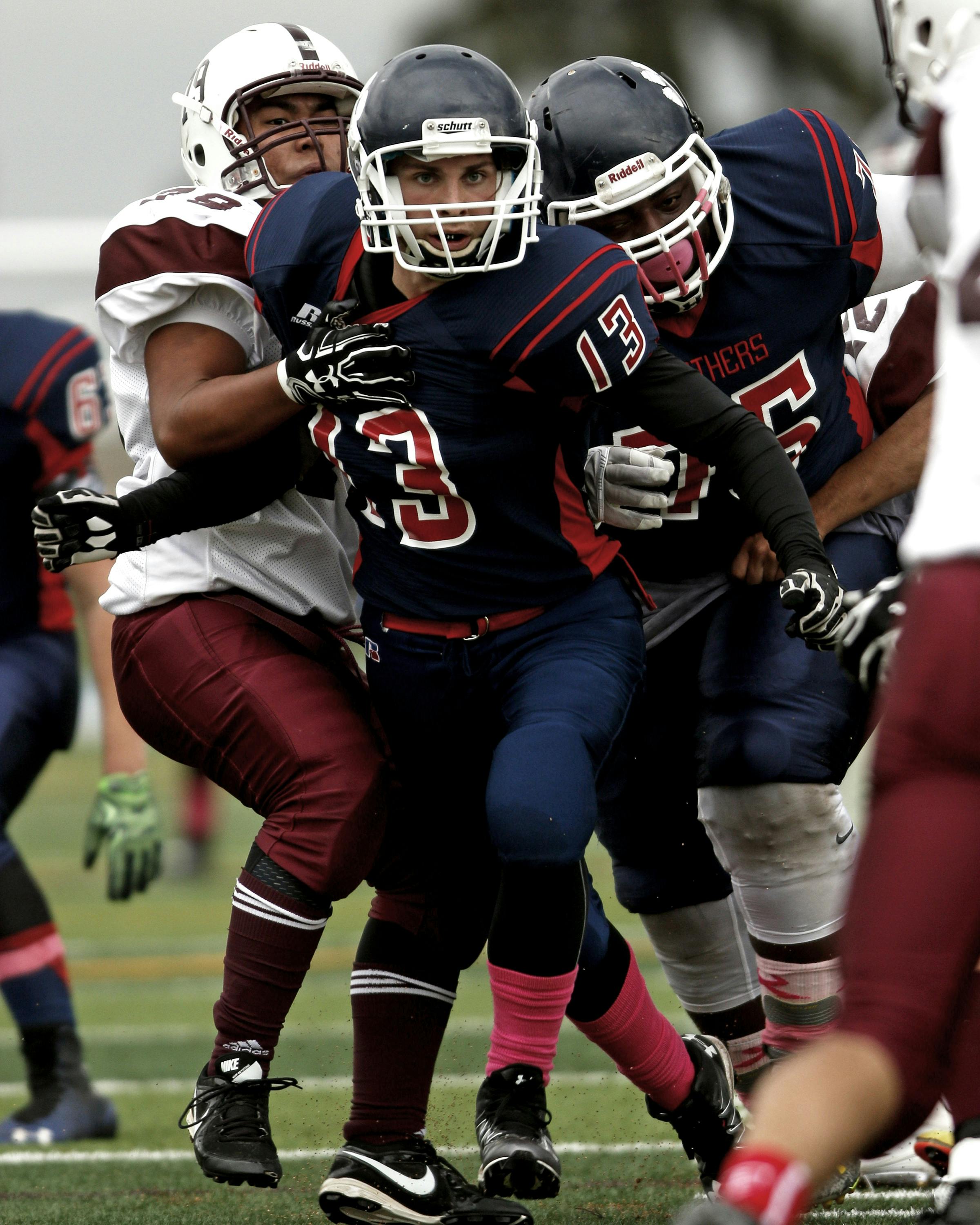 group of people playing football