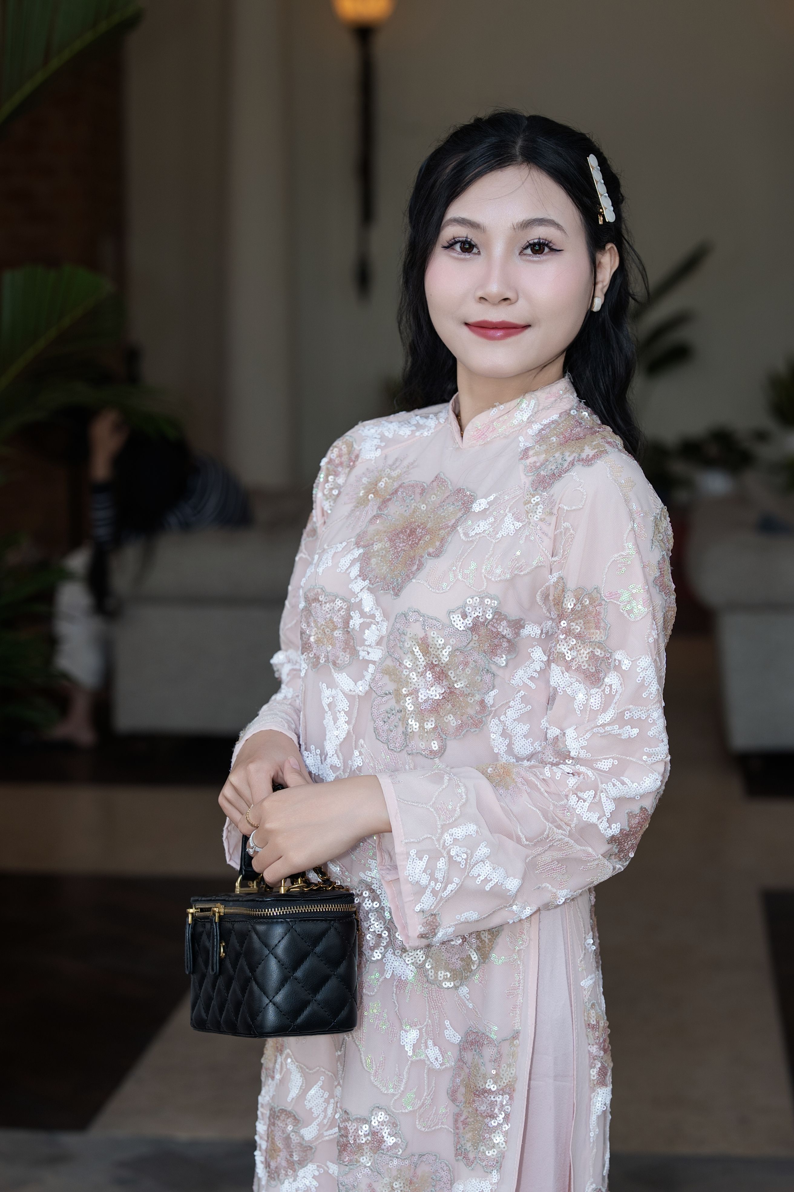 Elegant Woman in Floral Traditional Dress Indoors · Free Stock Photo