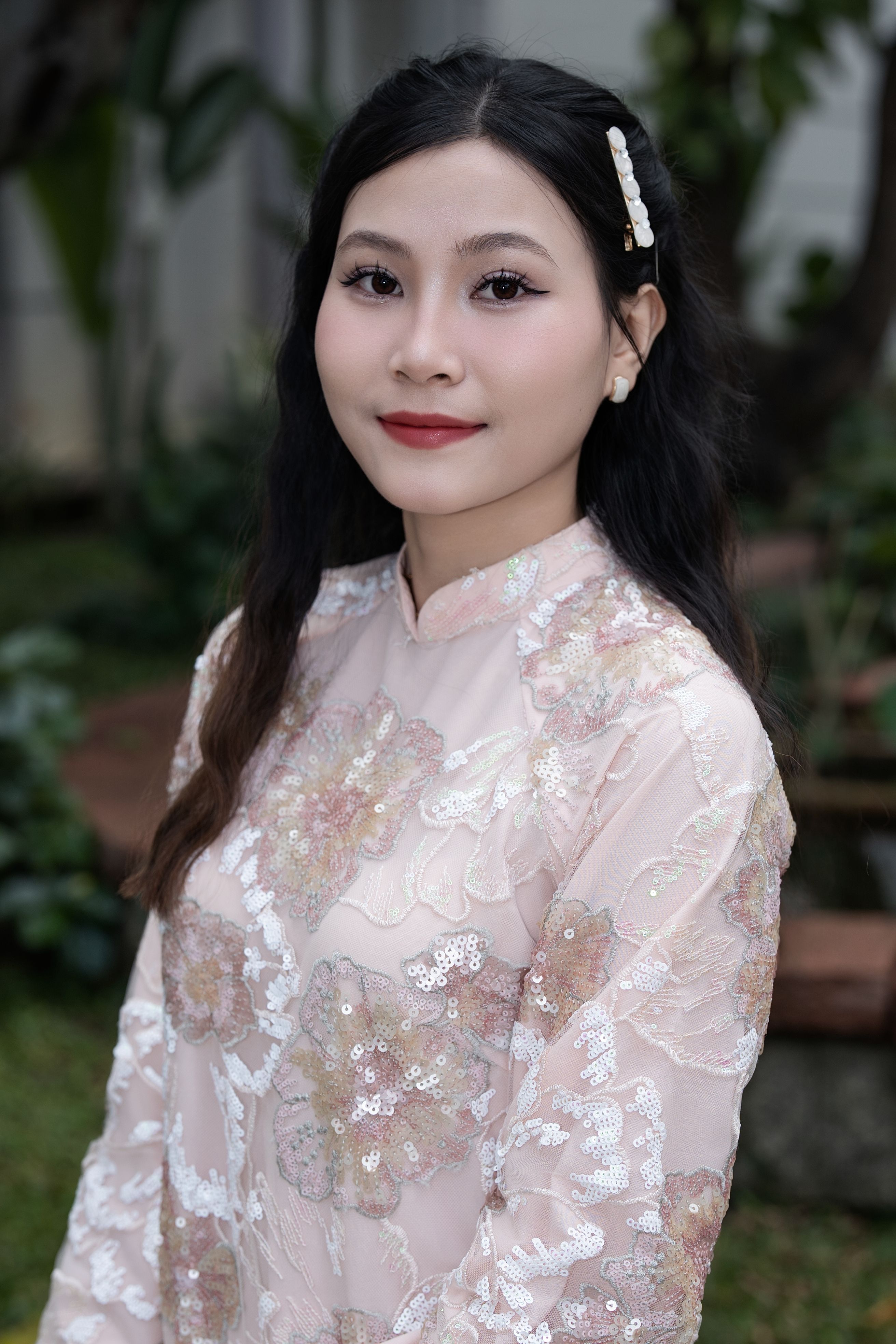 Elegant Woman in Floral Traditional Dress Outdoors · Free Stock Photo