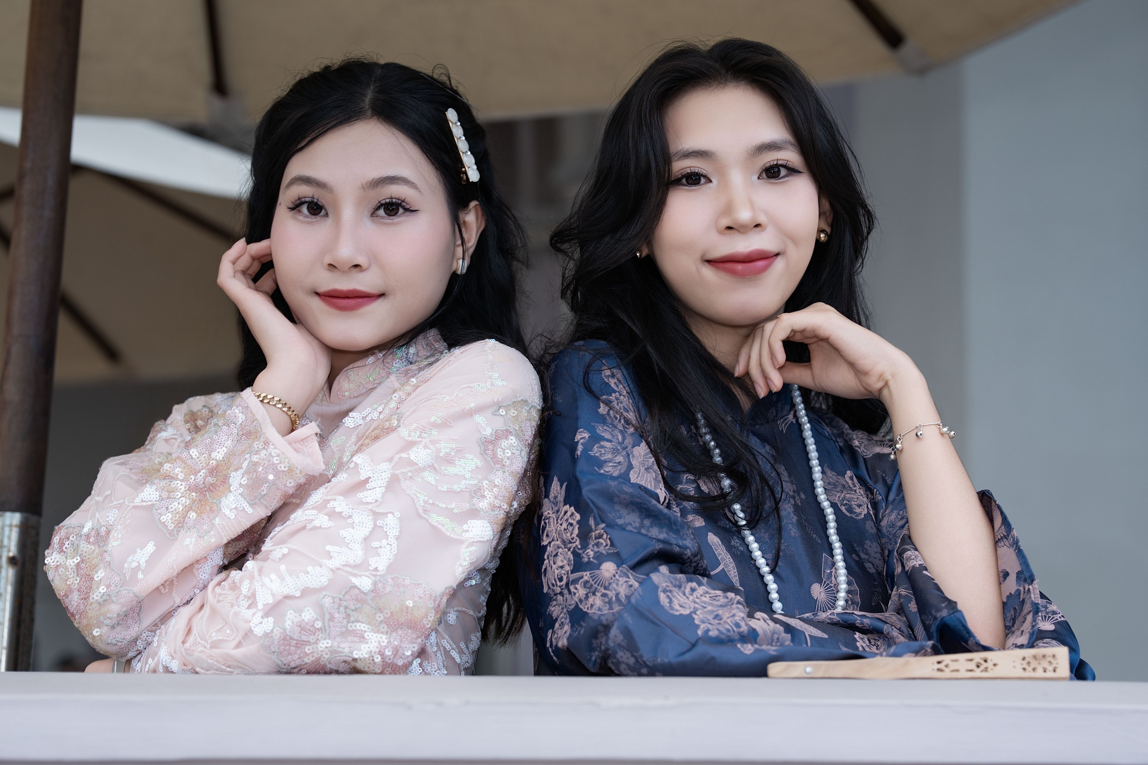 Elegant Portrait of Two Women in Traditional Attire · Free Stock Photo