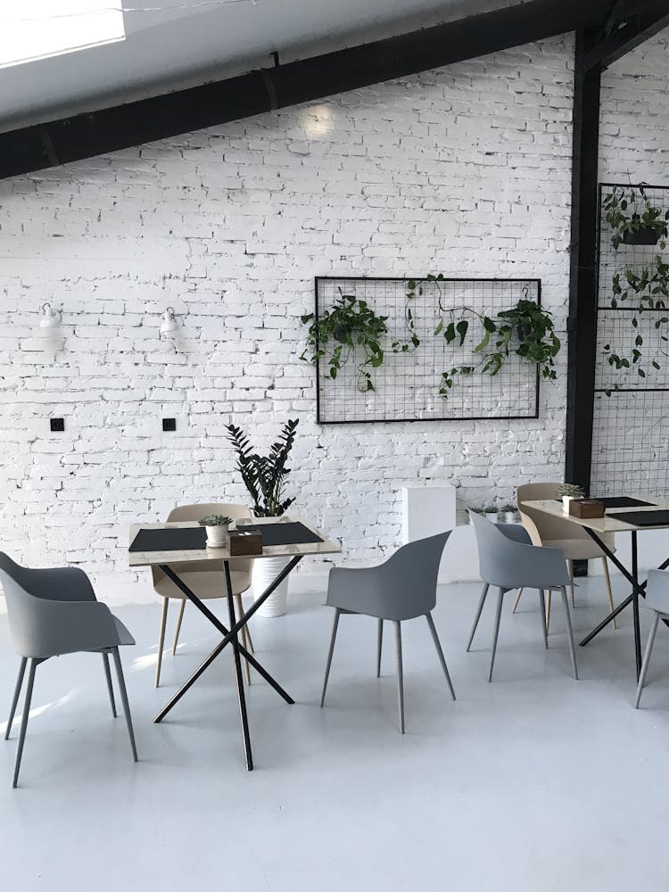 Chairs And Tables Inside A Room