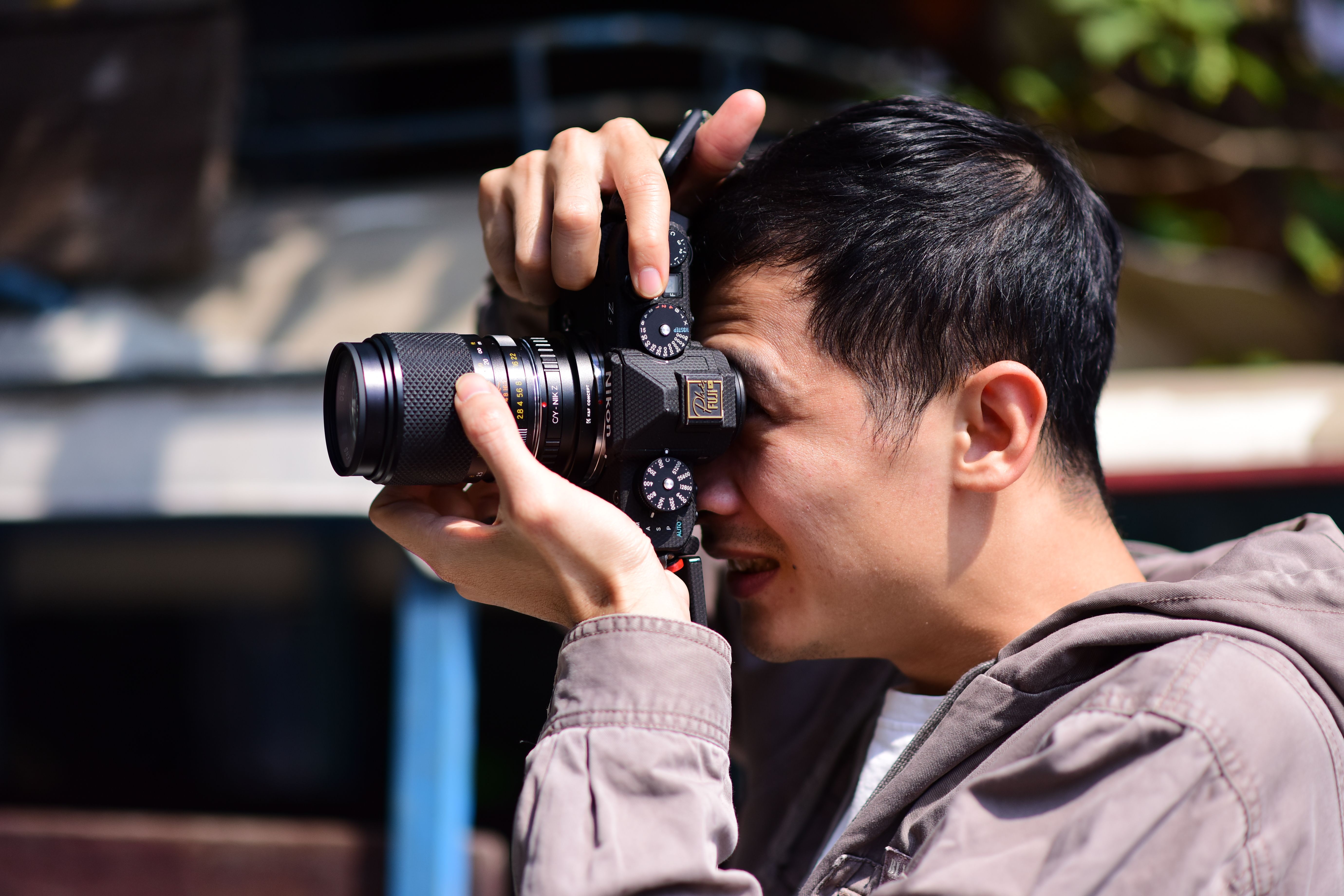 Ppl With Camera Person Holding Black Dslr Camera · Free Stock Photo