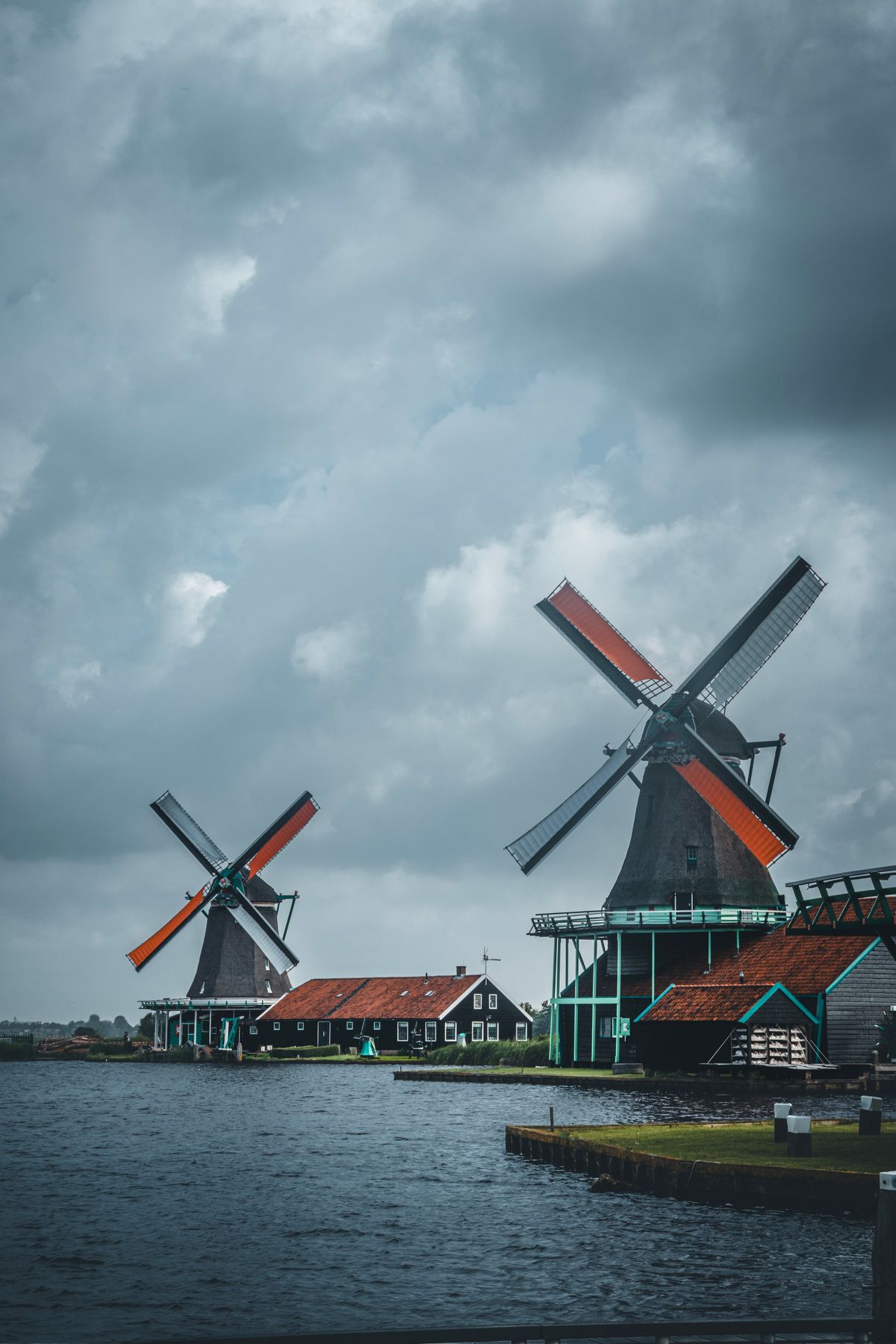Traditional green windmill at Zaanse Schans in the Netherlands