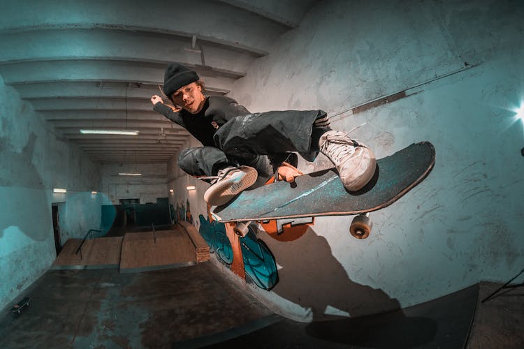 Photo Of Man Skateboarding