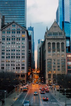 Explore the vibrant Chicago skyline with bustling streets at dusk.