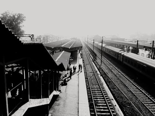 Grayscale Photo of Train Station