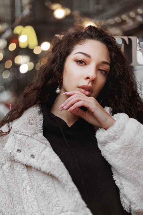 Woman Wearing White Fur Coat