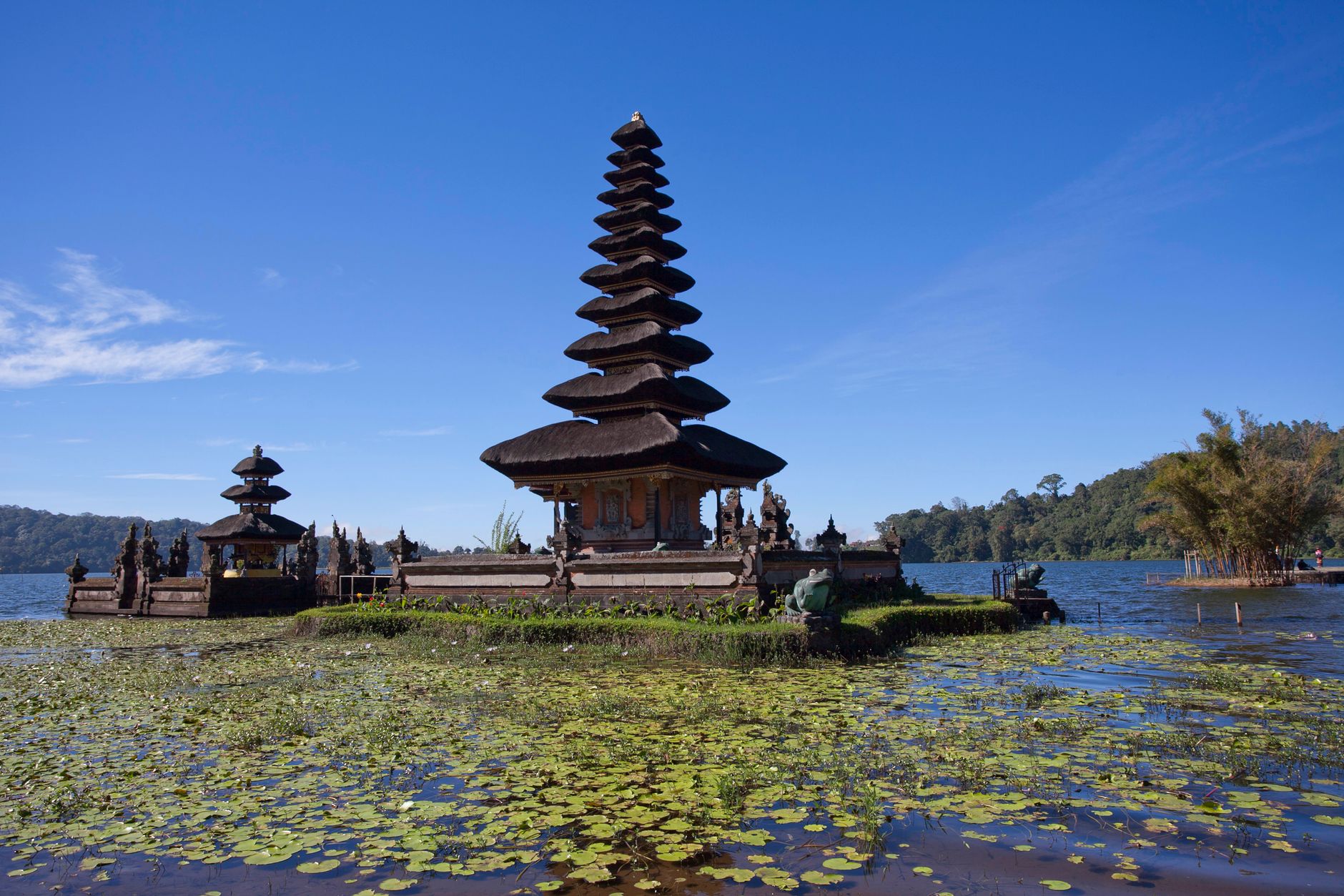 Captivating view of Ulun Danu Beratan Temple floating on a calm lake in Bali, Indonesia.