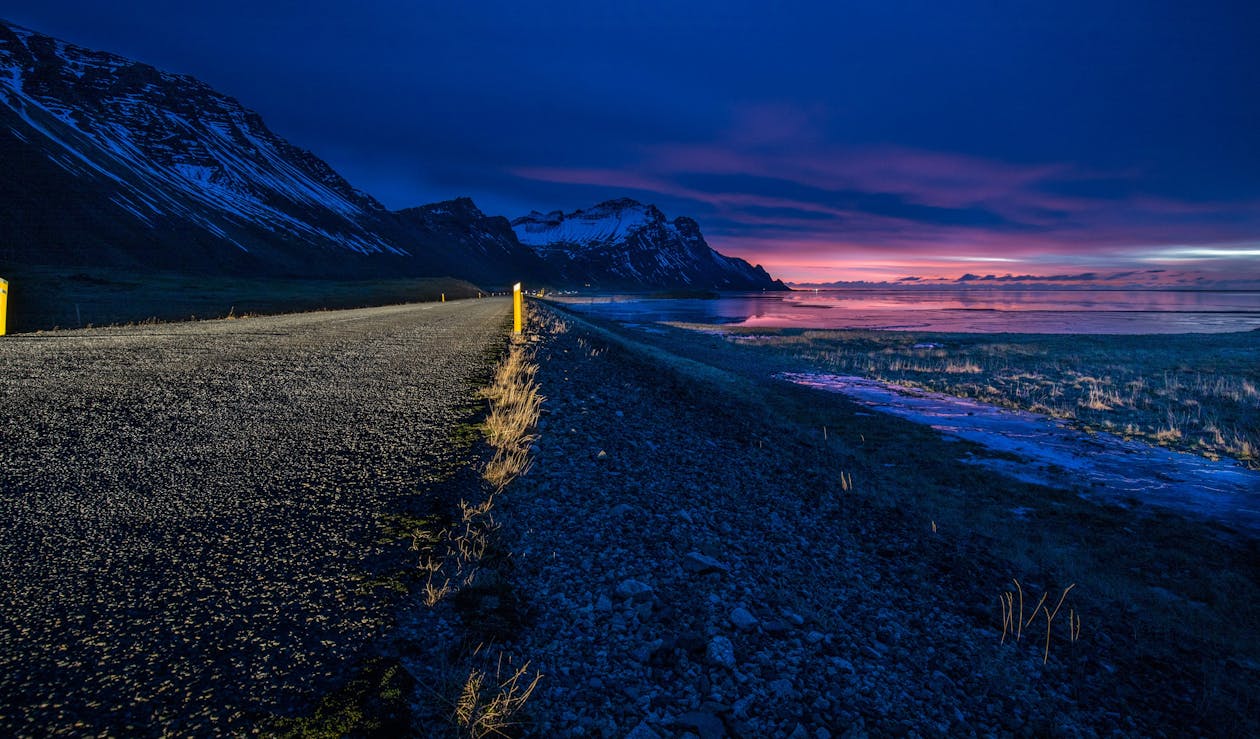 Gray Rocky Road during Nightime