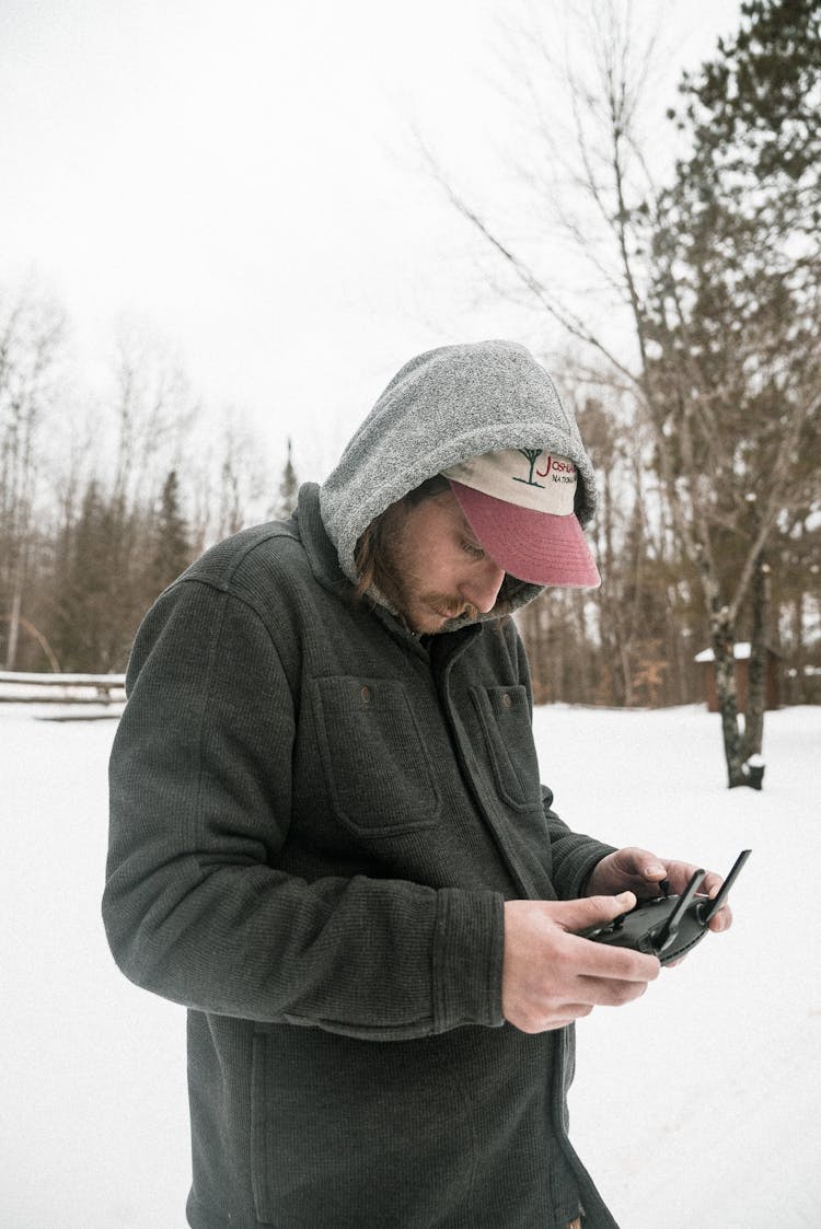 Man Holding A Drone Controller