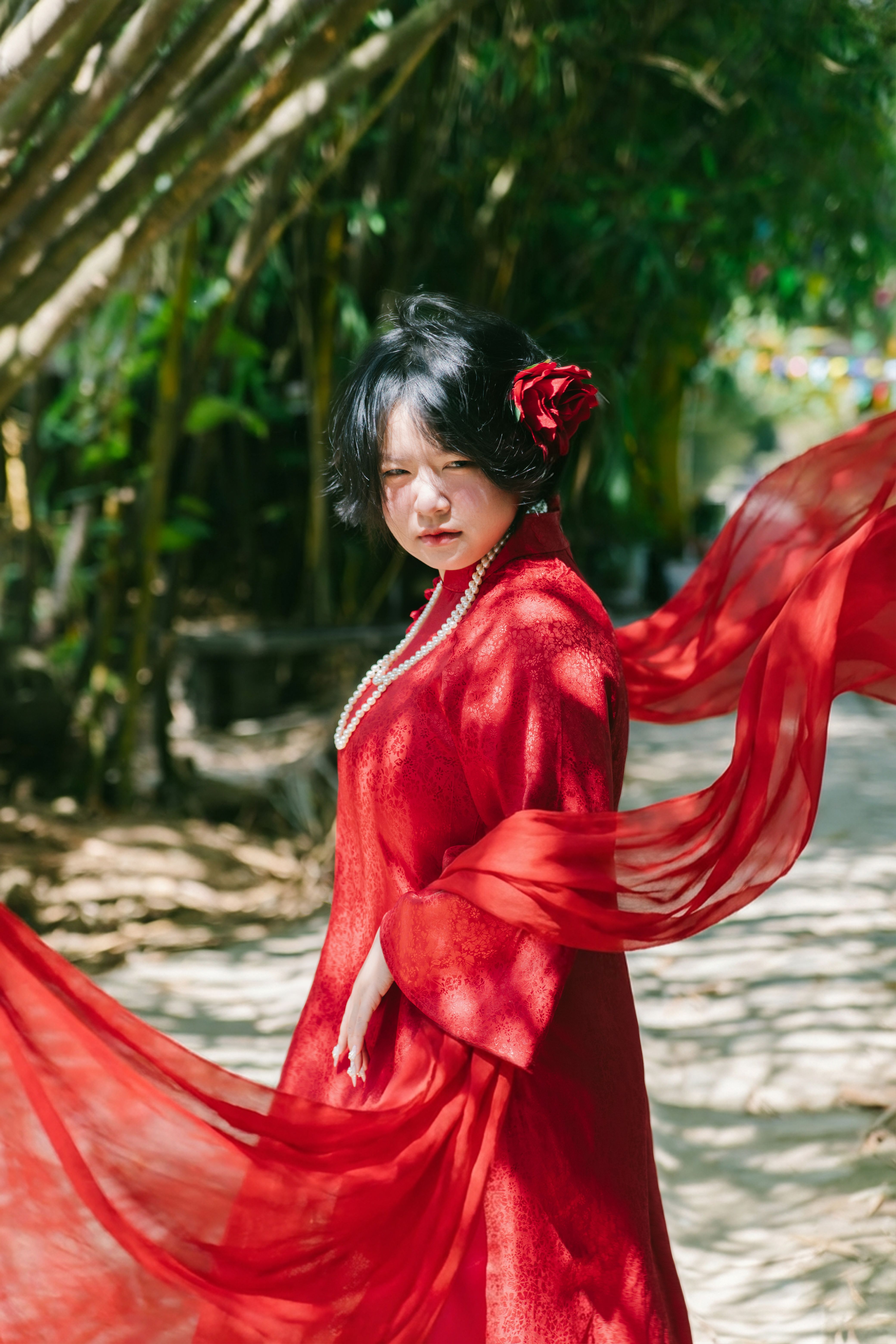 Elegant Woman in Red Dress Outdoors · Free Stock Photo