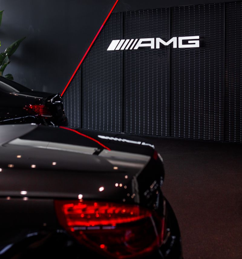 Luxury Mercedes AMG car in a sleek showroom setting