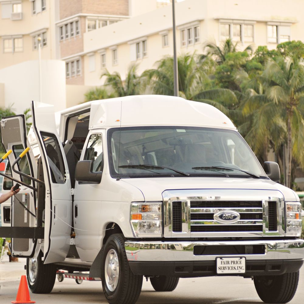 Mossend — movers delivering furniture from a van