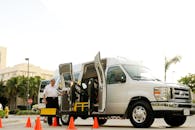 Wheelchair Accessible Van with Driver Outdoors