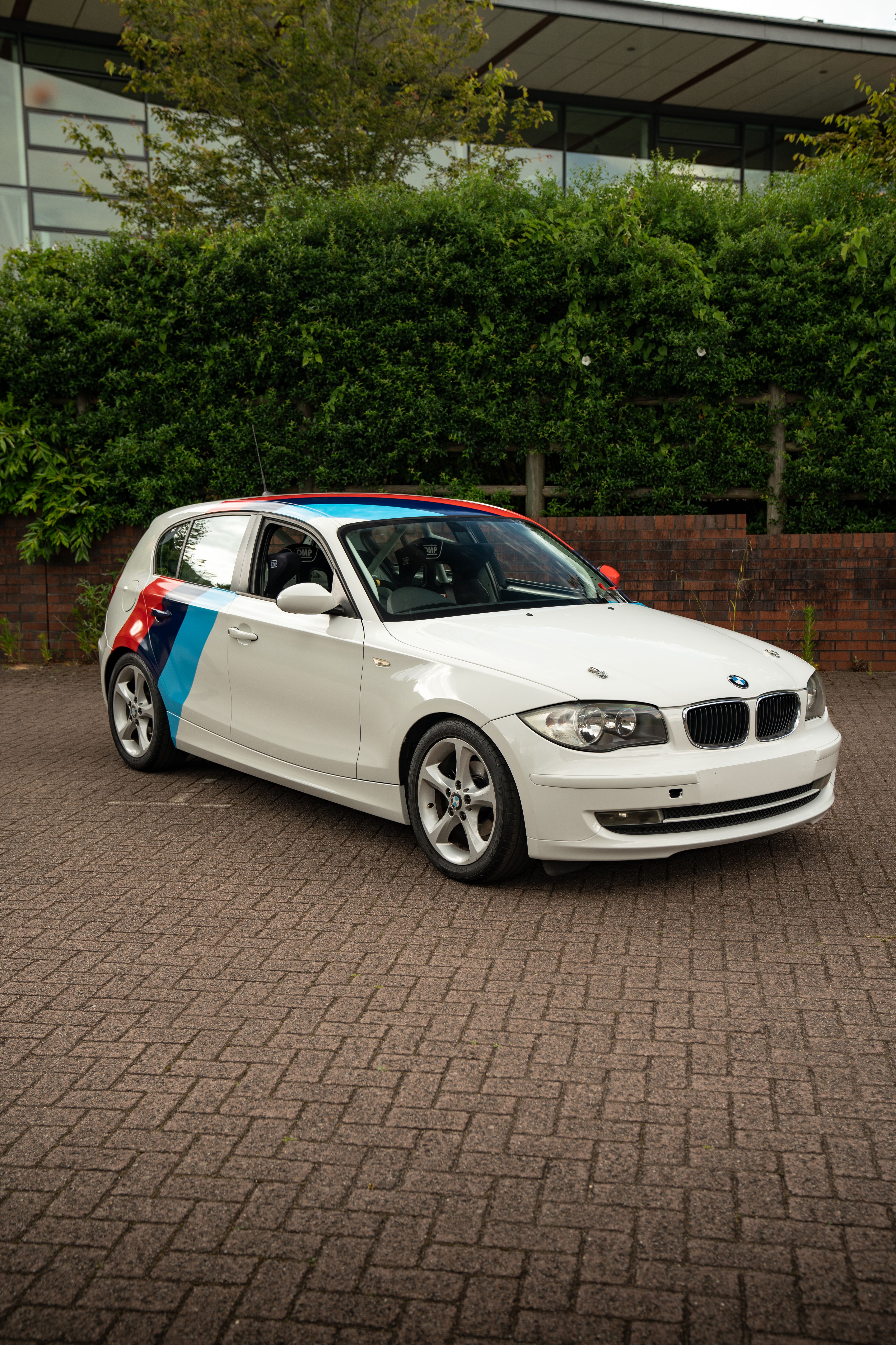 Modern white car with sporty accents in Southampton · Free Stock Photo