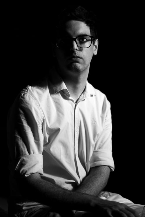 Free Dramatic black and white portrait of a man in emotional expression and high contrast lighting. Stock Photo