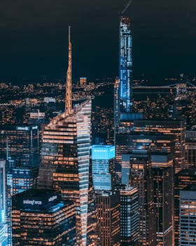 A captivating aerial view of New York City's glowing skyscrapers at night.