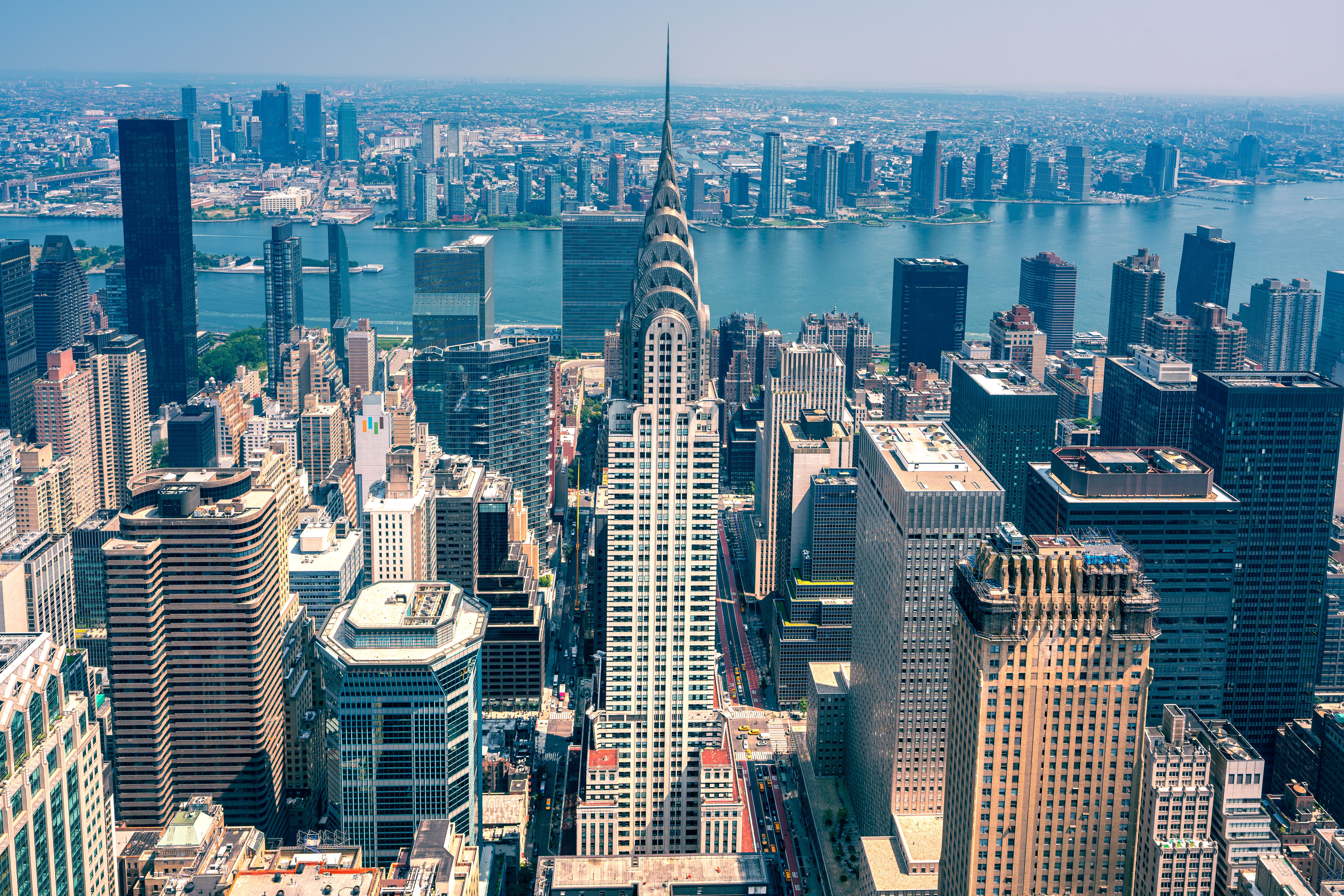 Stunning aerial view of New York City featuring the Chrysler Building and surrounding skyline.