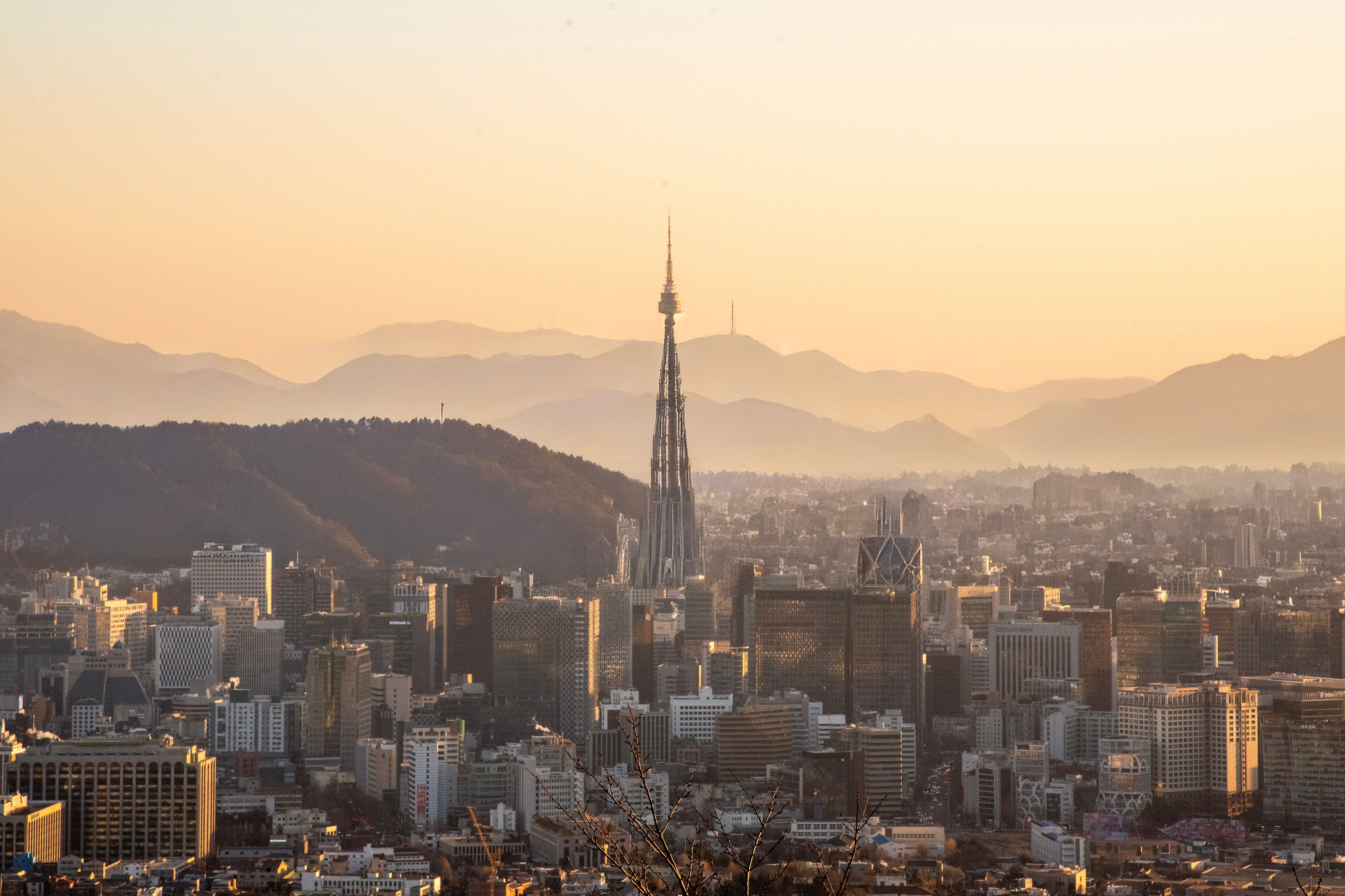 Vibrant Seoul cityscape at sunset with Namsan Tower, representing medical tourism destination