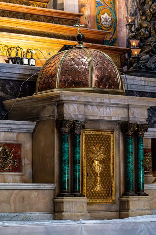 Free An ornate tabernacle with decorative details inside a historic church. Stock Photo