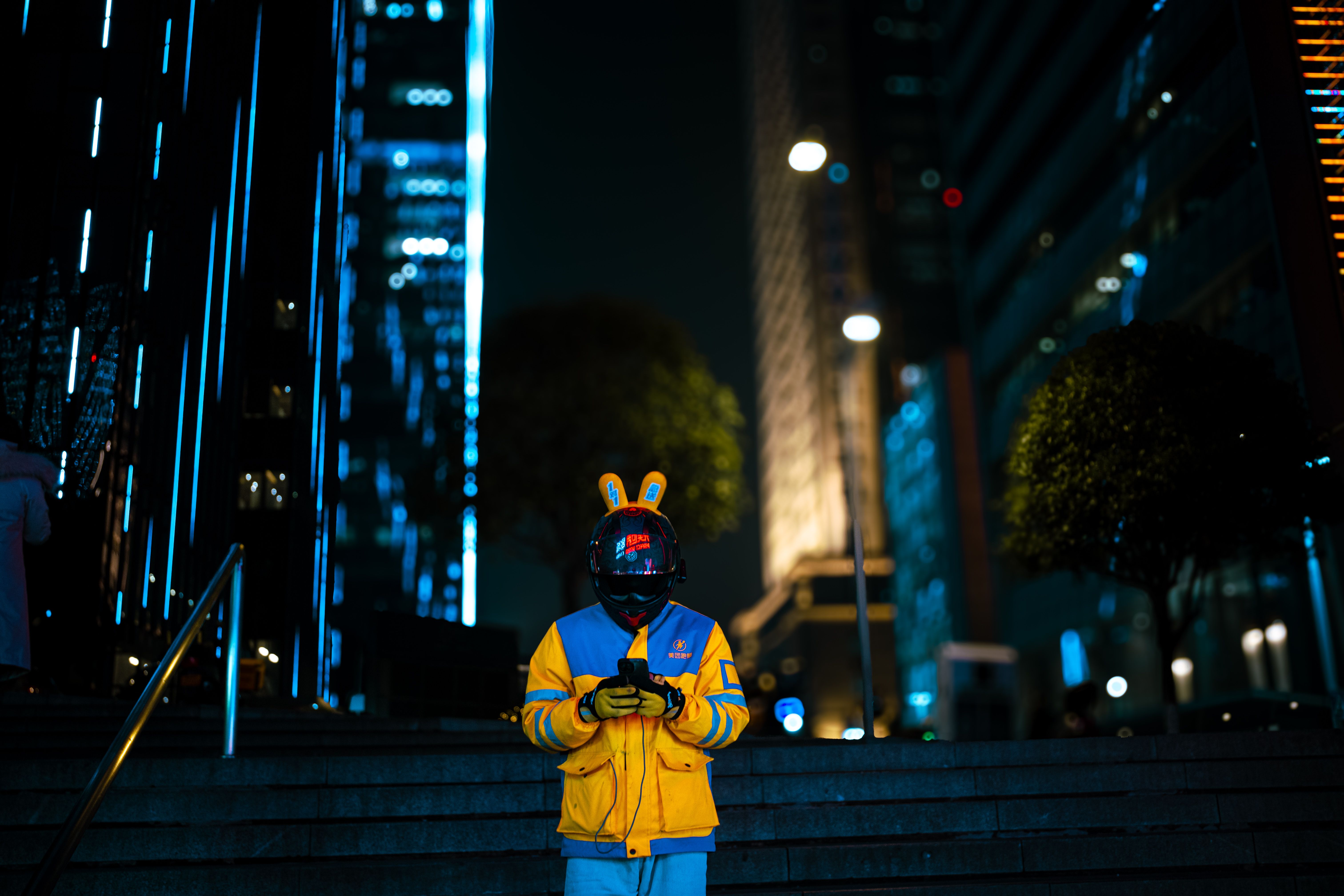 Urban Night Scene in Chongqing with Delivery Rider · Free Stock Photo