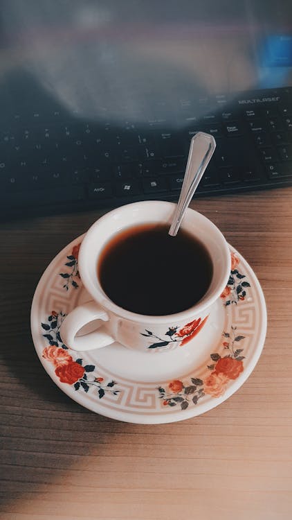Free White Ceramic Cup Of Black Coffee Stock Photo