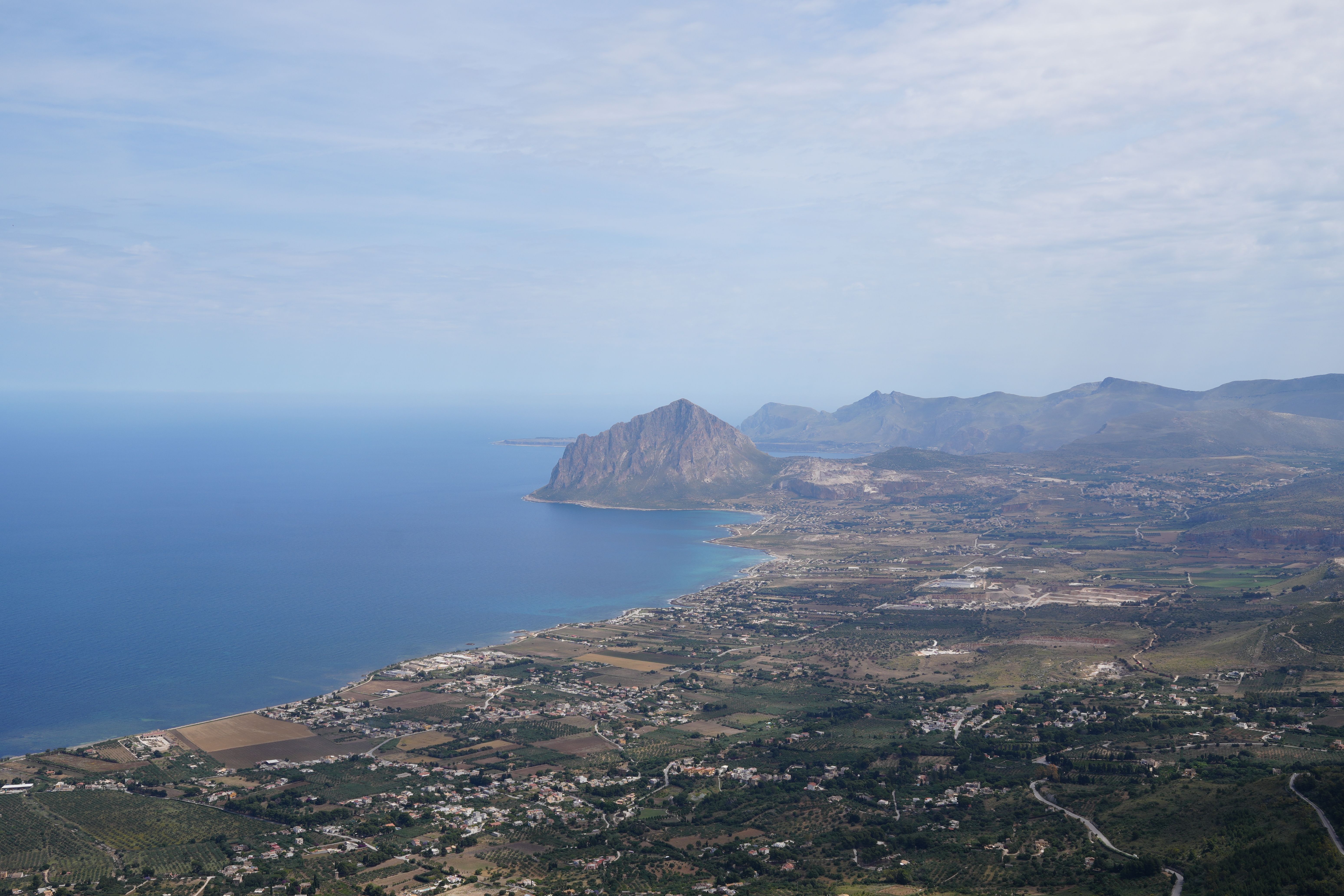 A stunning aerial view of the coastal landscape near Monte Cofano, Erice, Sicily.