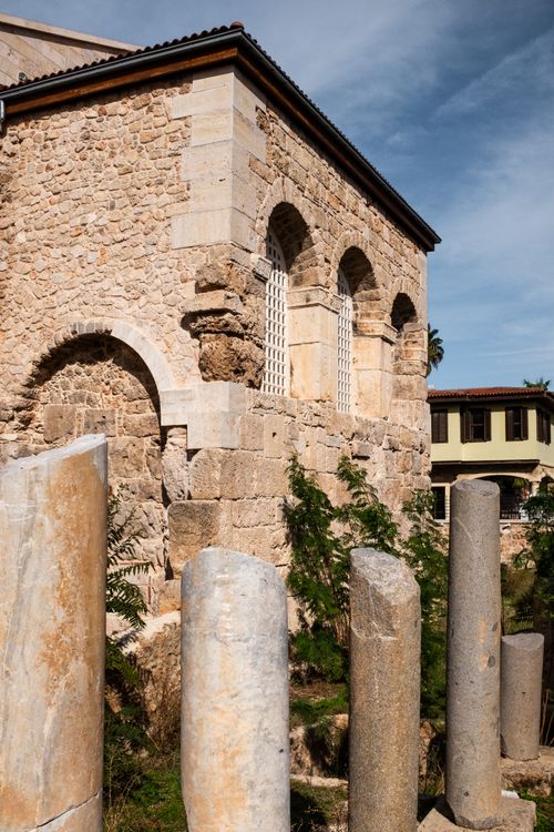 Free Ancient stone structure with columns, bathed in daylight, showcasing historic architecture. Stock Photo