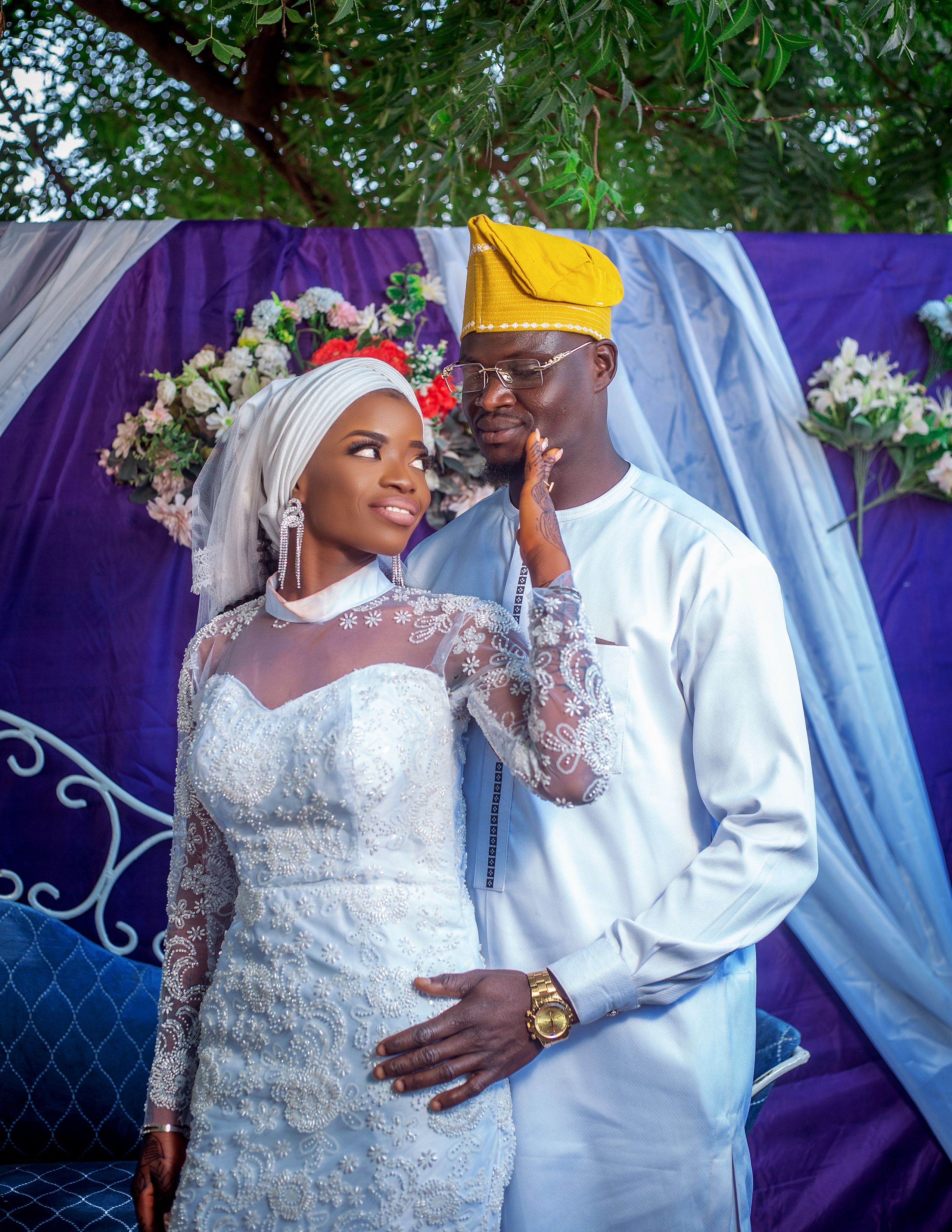 sachin and babi light blue dress What to Wear to an African Wedding: A Guest's Style Guide main image 1